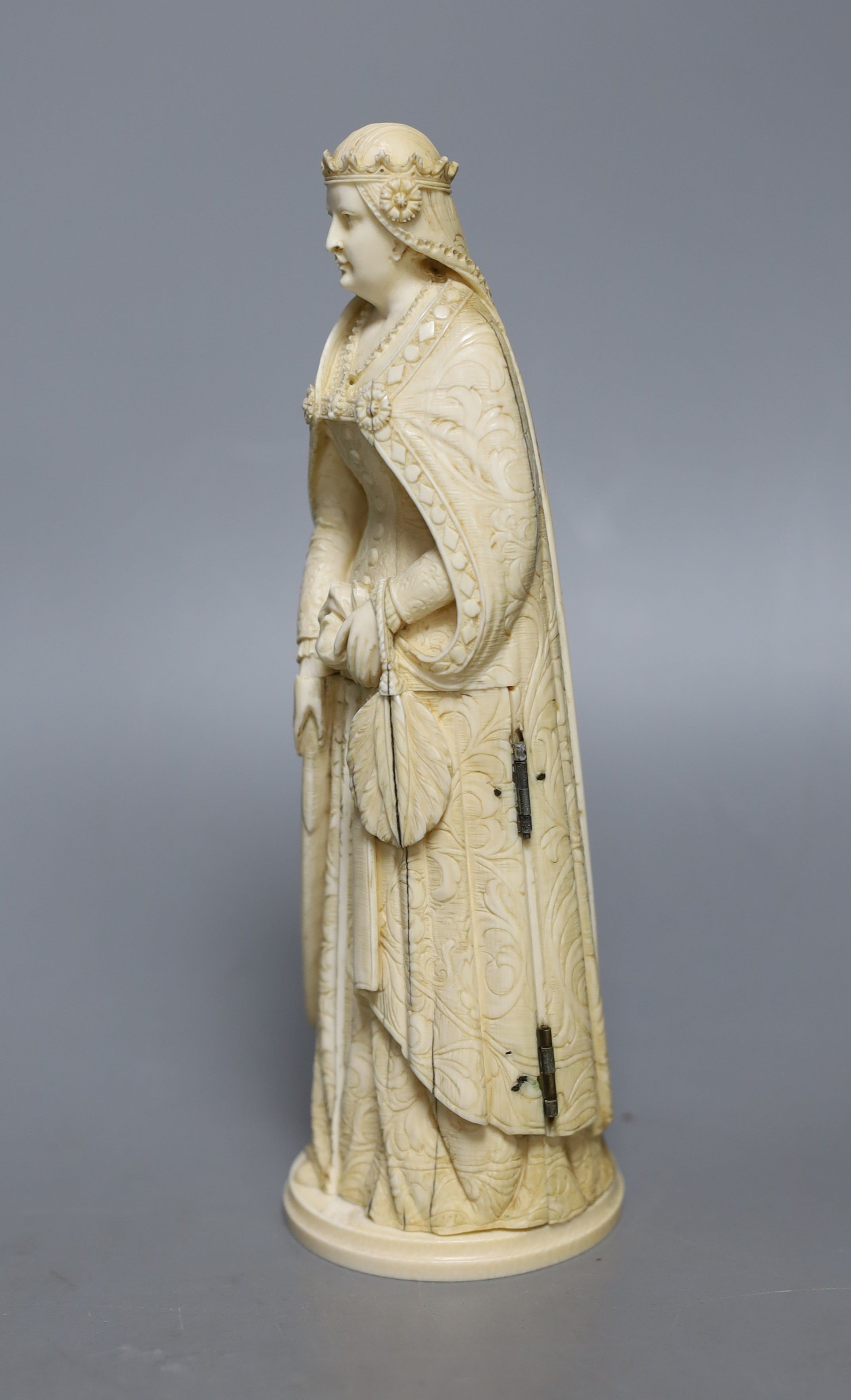 A late 19th century Dieppe ivory triptych figure of Eleanor of Aquitaine, 20cm 21 cm high